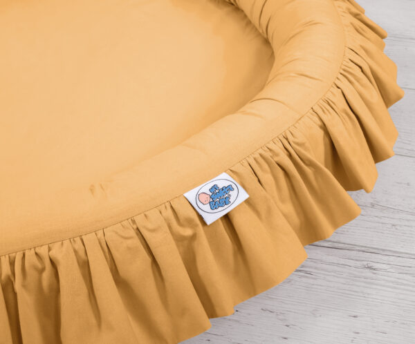 Gniazdko z falbanką – musztardowe